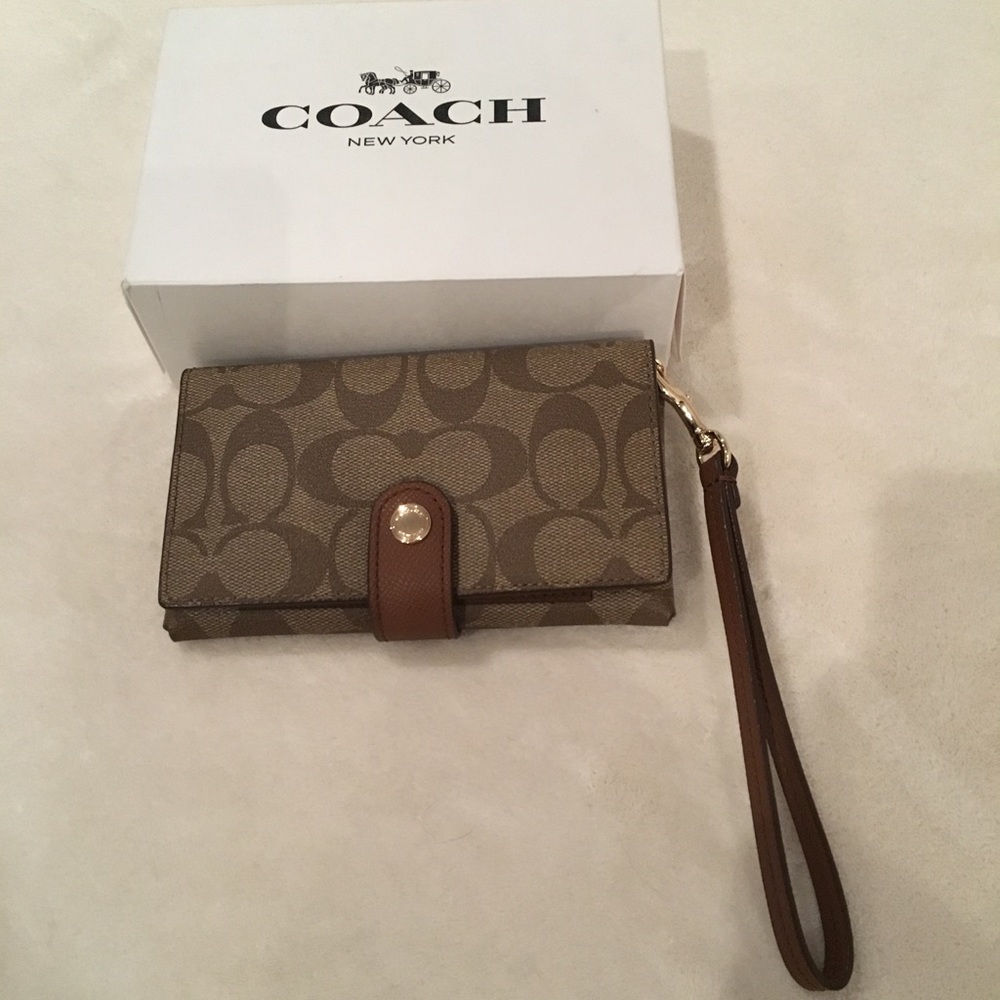 Brand new Coach clutch! Fits phone and more!